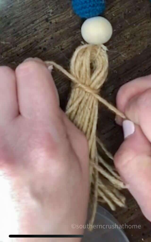 tying tassel at the top