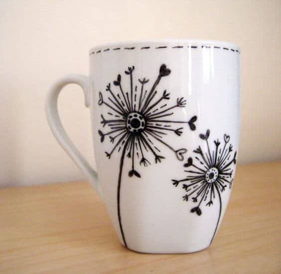 Dandelion design with Sharpie on a mug