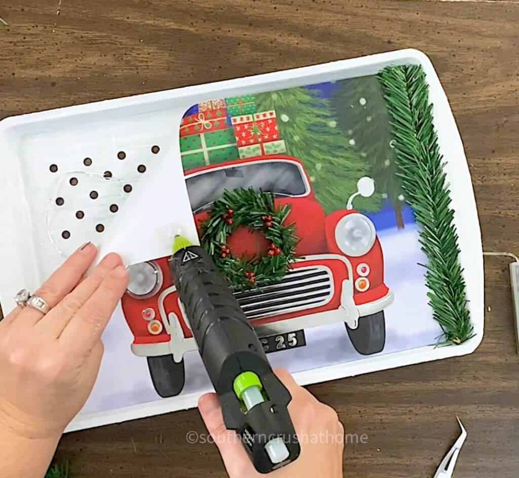 gluing gift back to grill pan