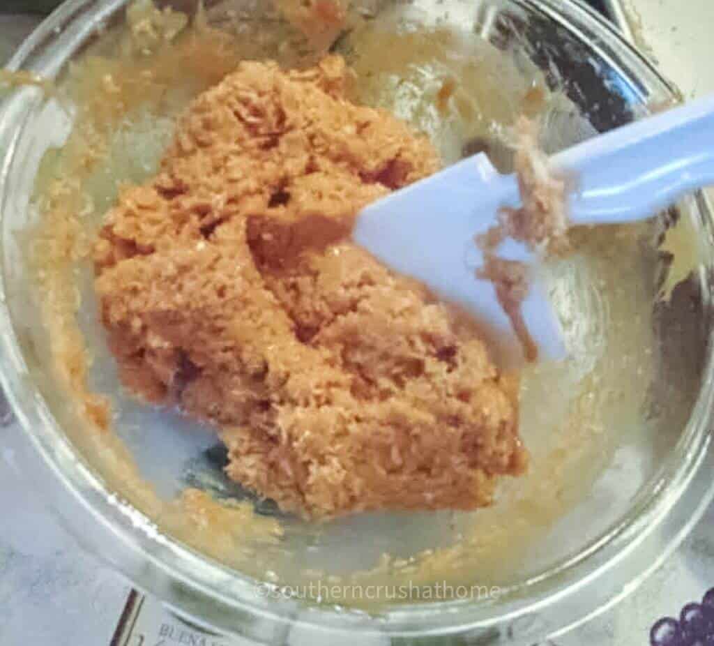 mixing ingredients for peanut butter cookies