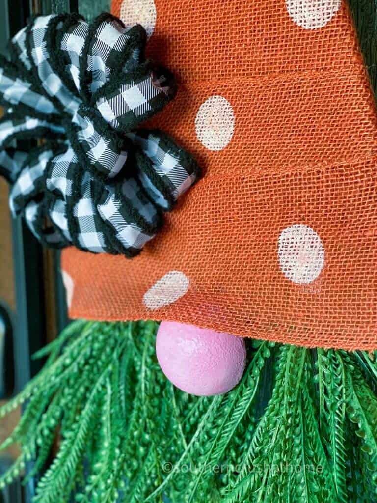 close up of burlap carrot gnome