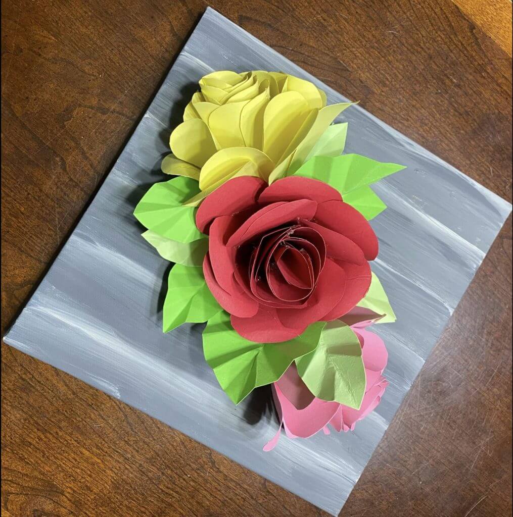 paper rose bouquet on table