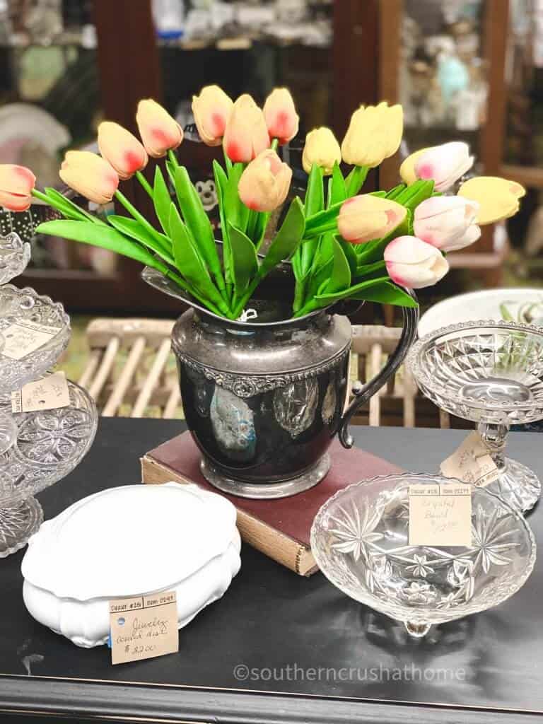 tulips in silver pitcher