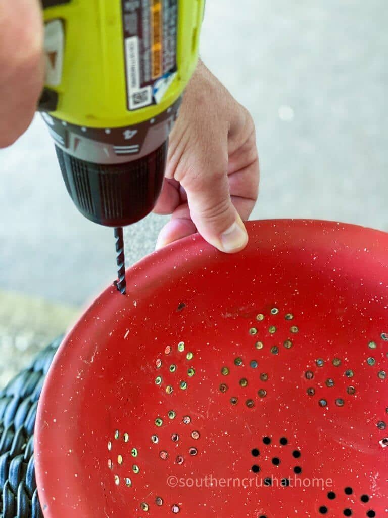drilling hole in colander