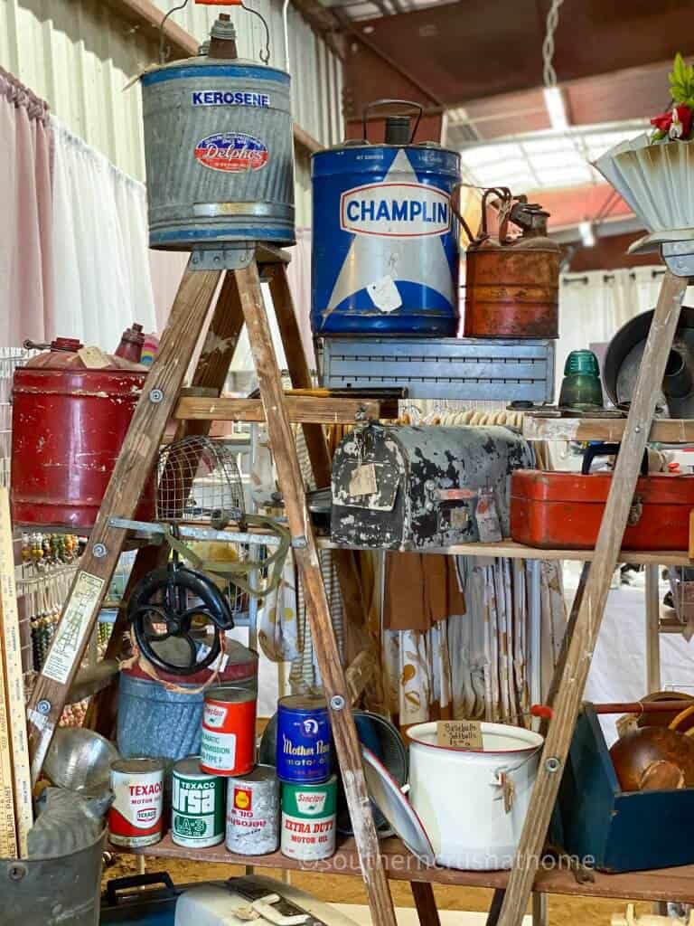 various vintage rustic metal gasoline cans and oil cans
