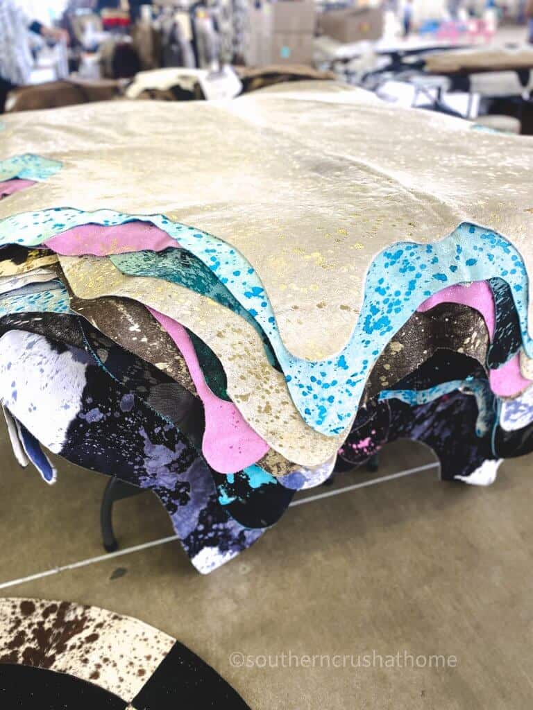 cowhide rugs stacked