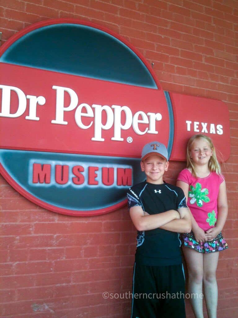 kids in front of the Dr Pepper museum in Waco TX