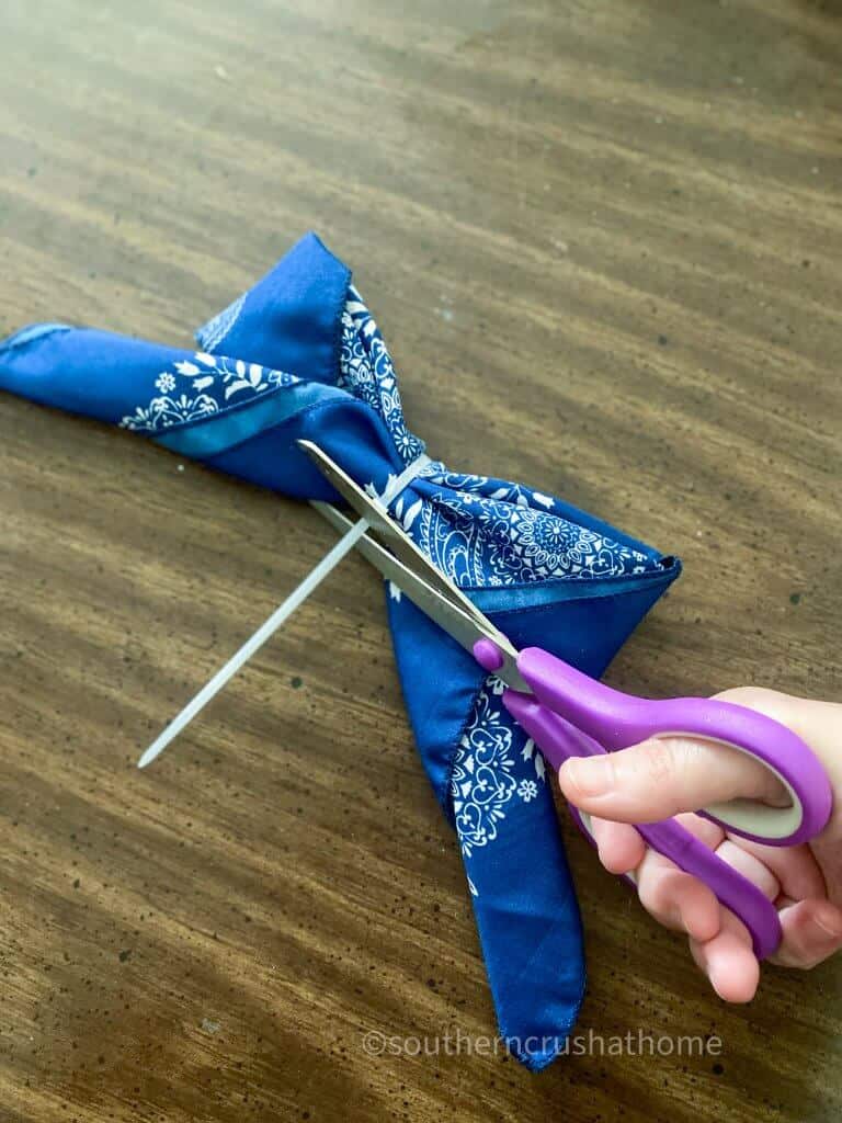 folded bandana bow cutting zip tie