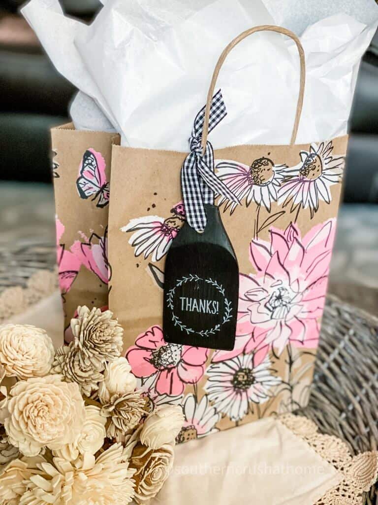 DT Wooden Spatula Gift Tag displayed on a gift sack