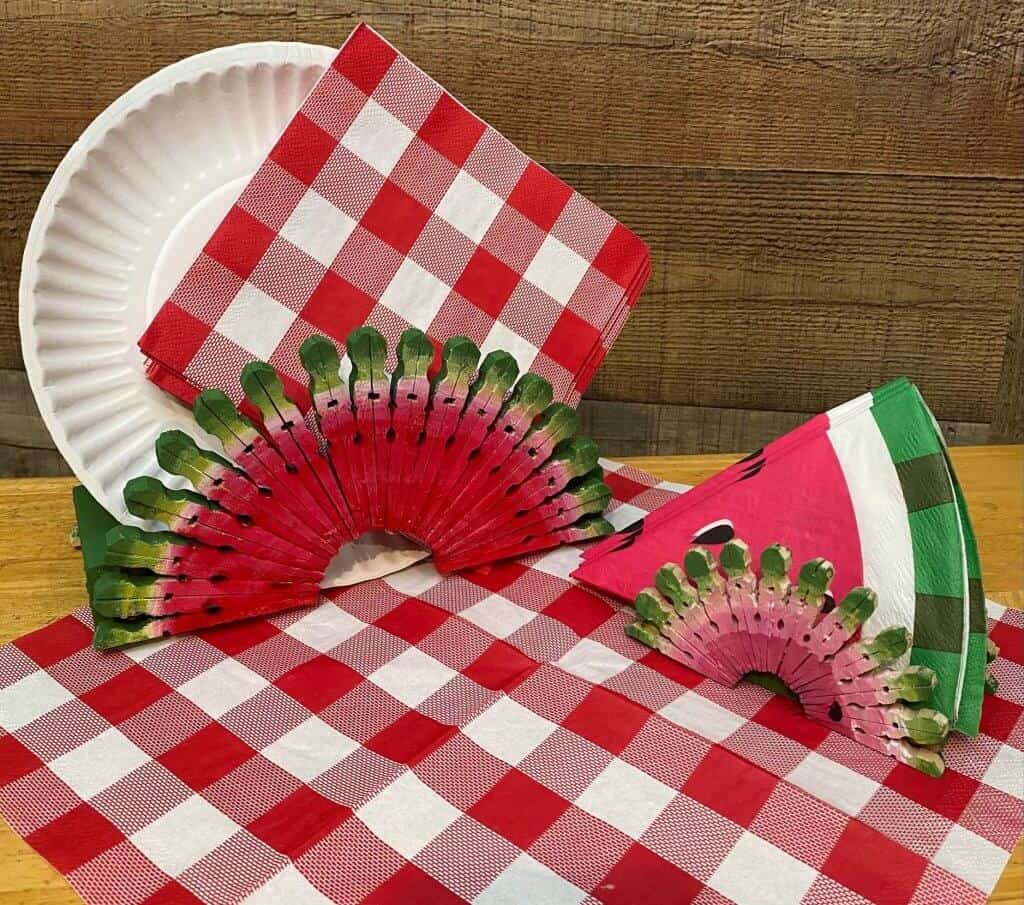 Dollar Tree Paper Plate Napkin Holder on table with napkins and plates