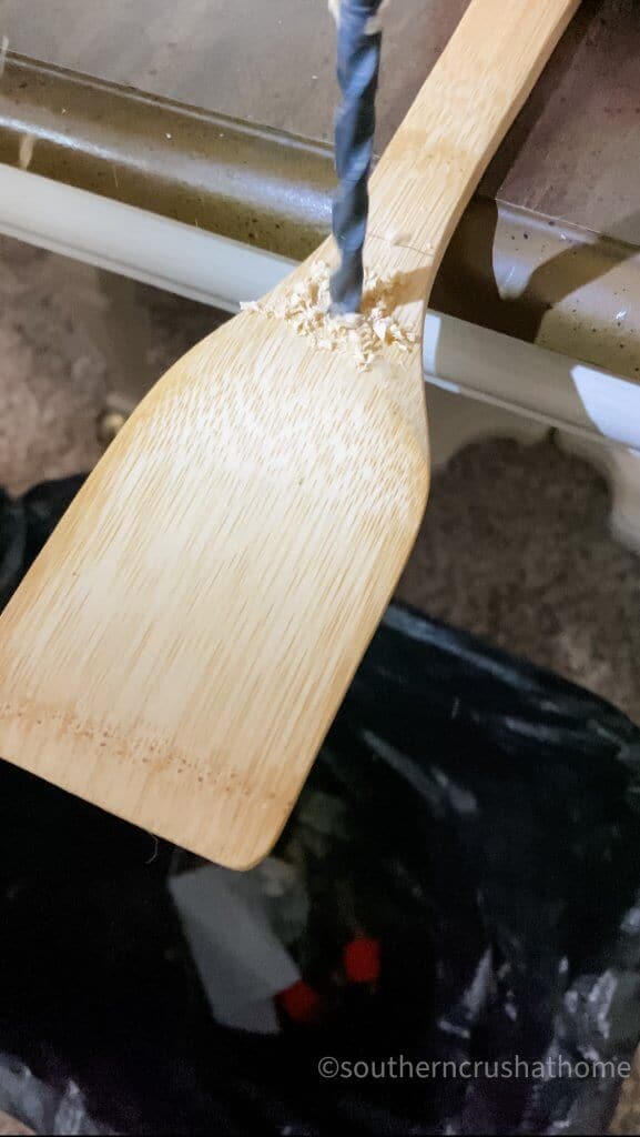 drilling a hole in wooden spatula