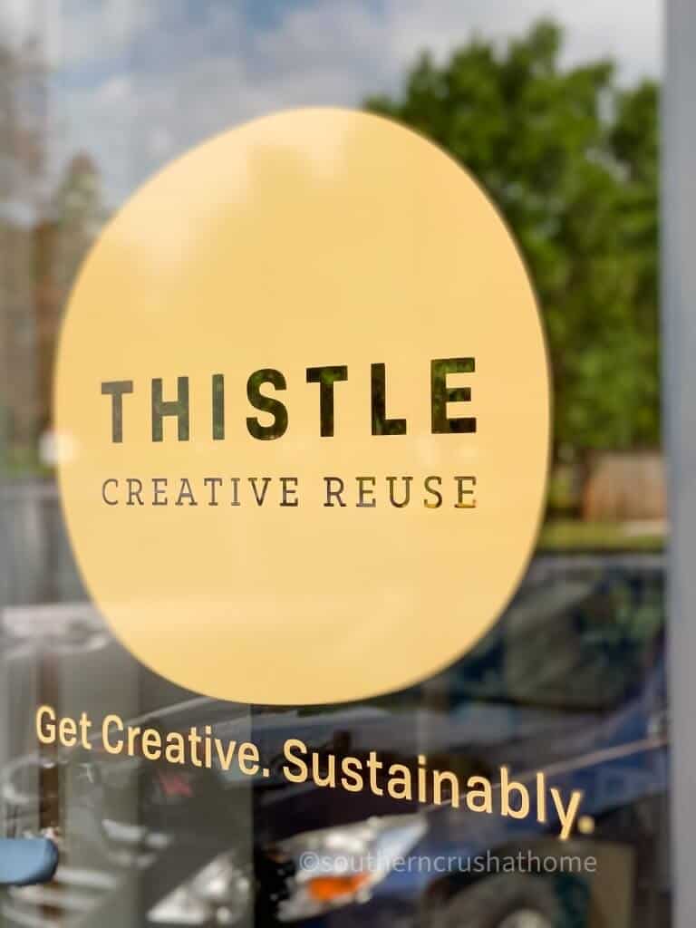 Thistle Creative Reuse front door logo