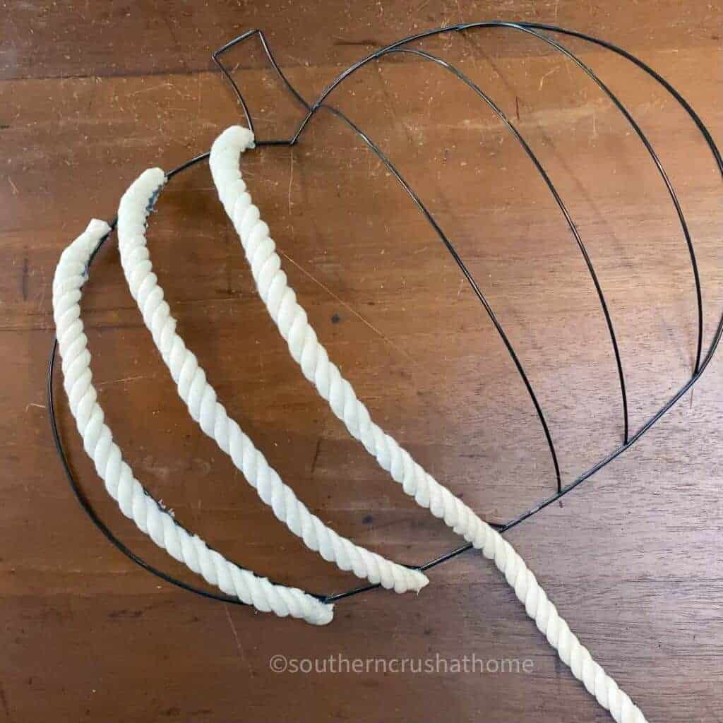 adding rope to each wire wreath form
