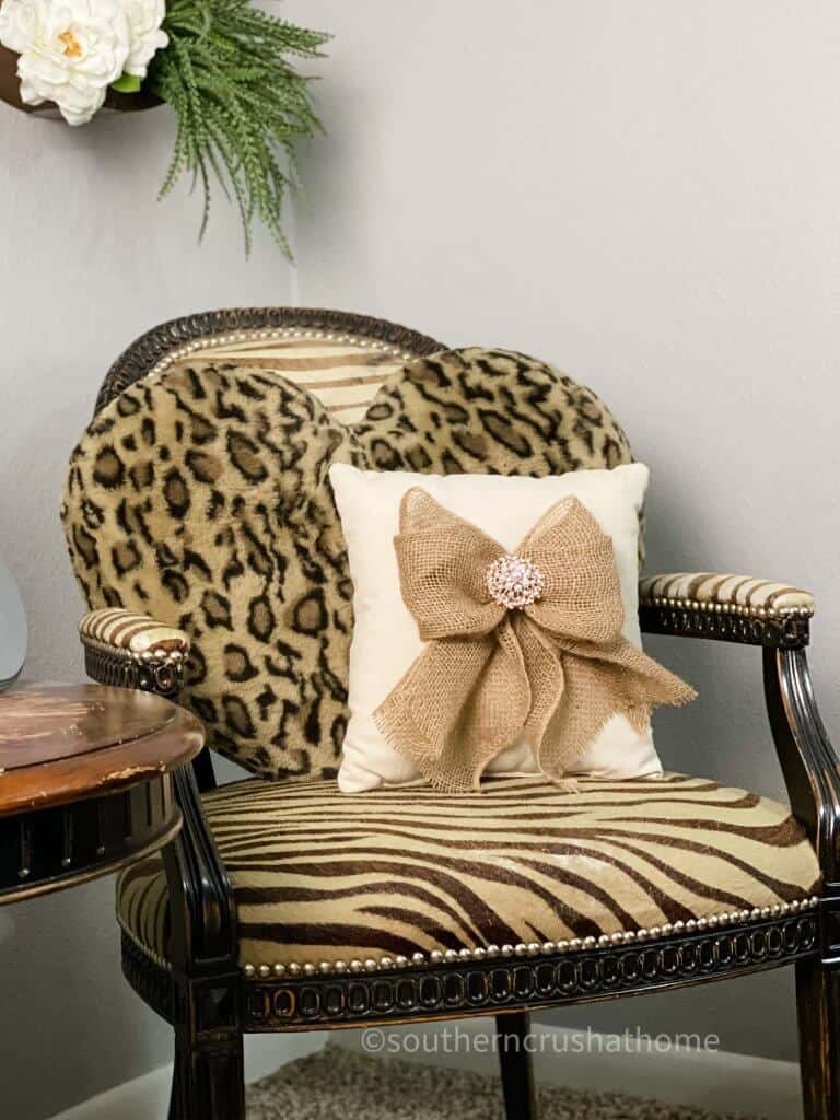 burlap bow on pillow on chair
