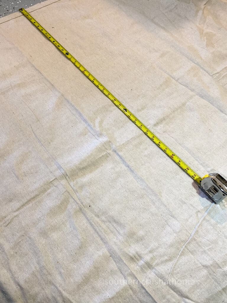 drop cloth with measuring tape