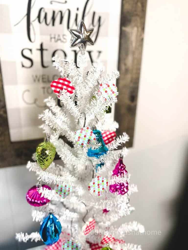 white tabletop christmas tree with shower curtain hooks