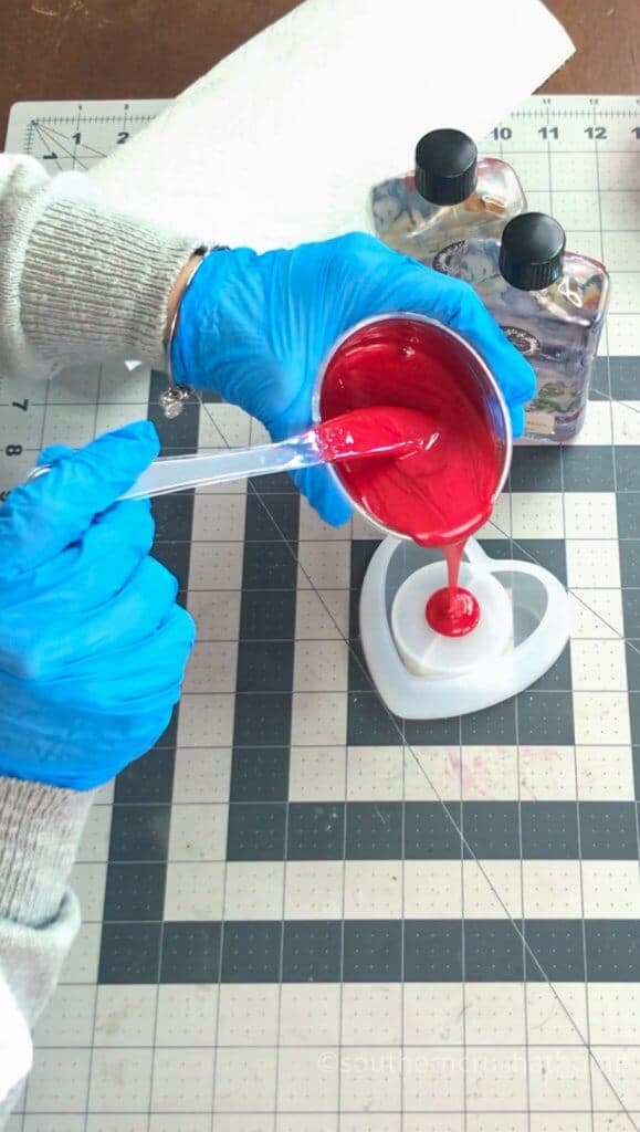 pouring resin into mold