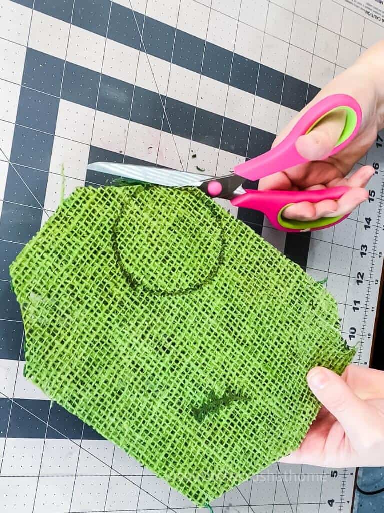 cutting out moss for candy jar