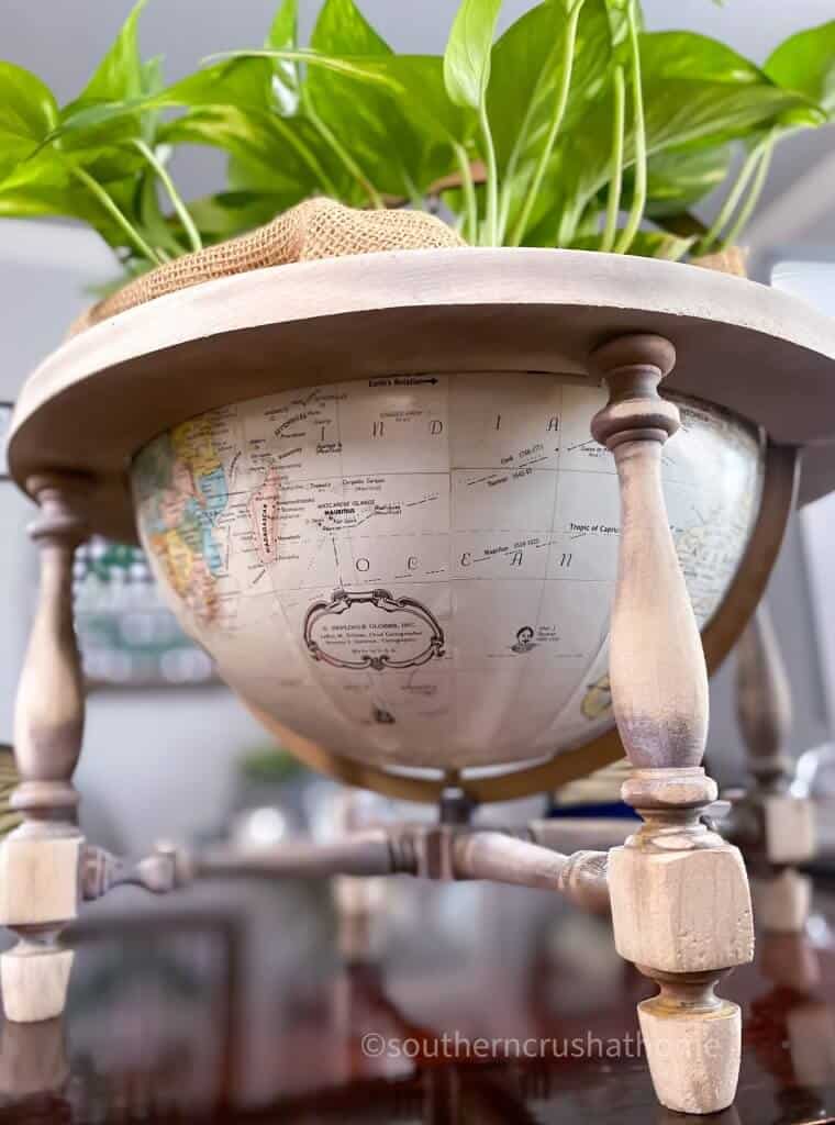 bottom view of bleached wood globe planter