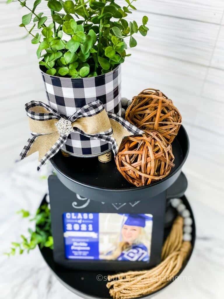 tin can planter on tiered tray