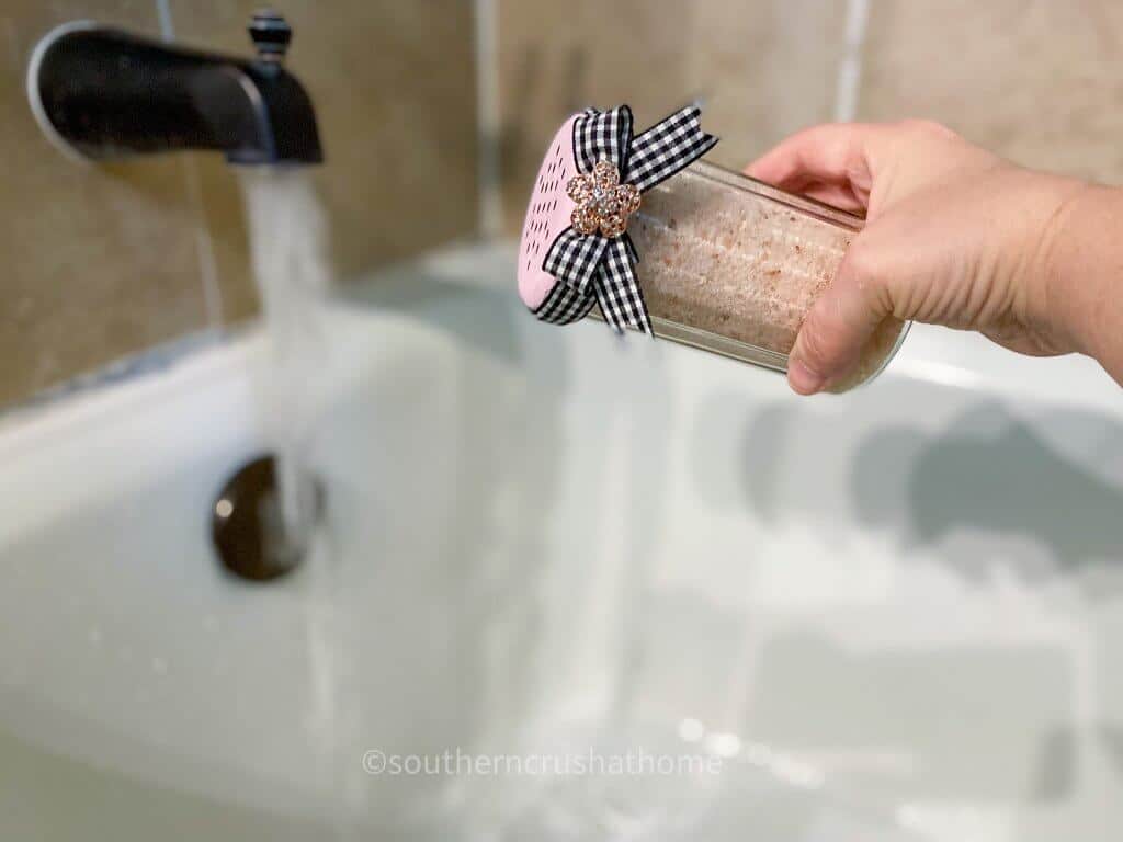pouring salt in bath as perfect mother's day gift idea