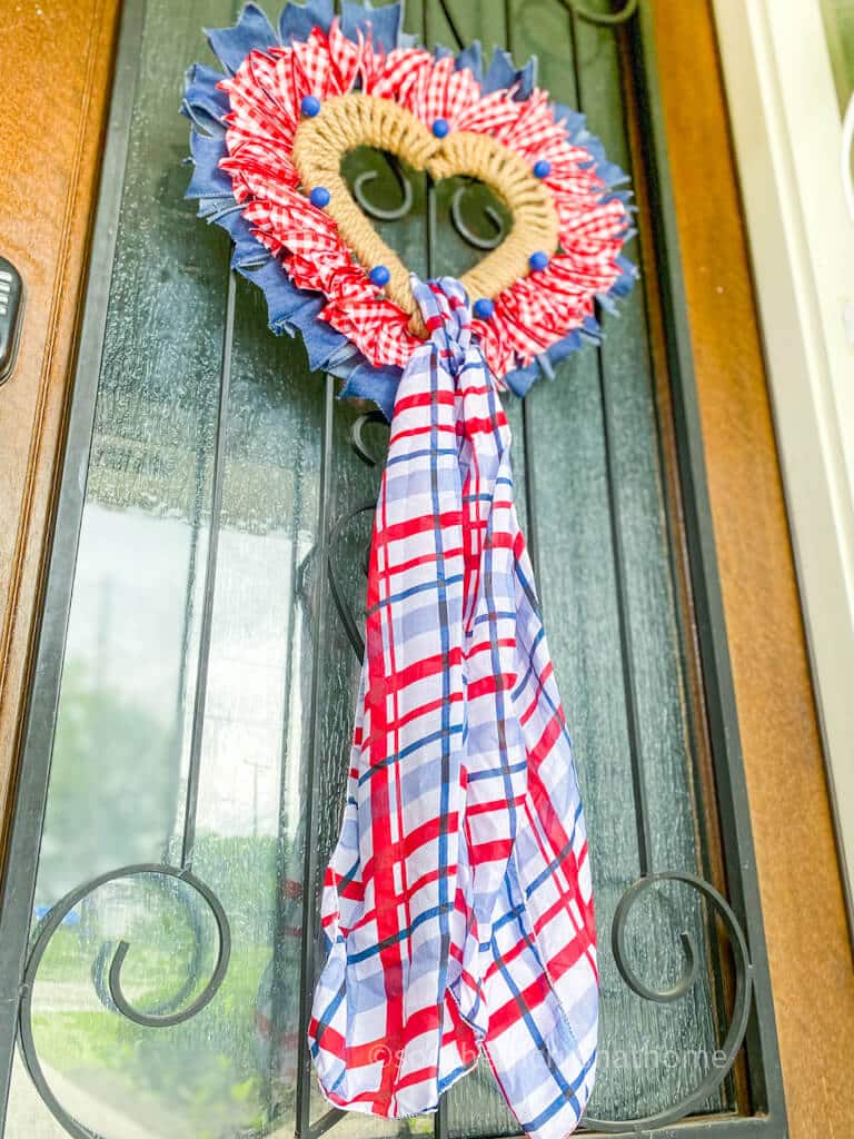 patriotic wreath with scarf on door