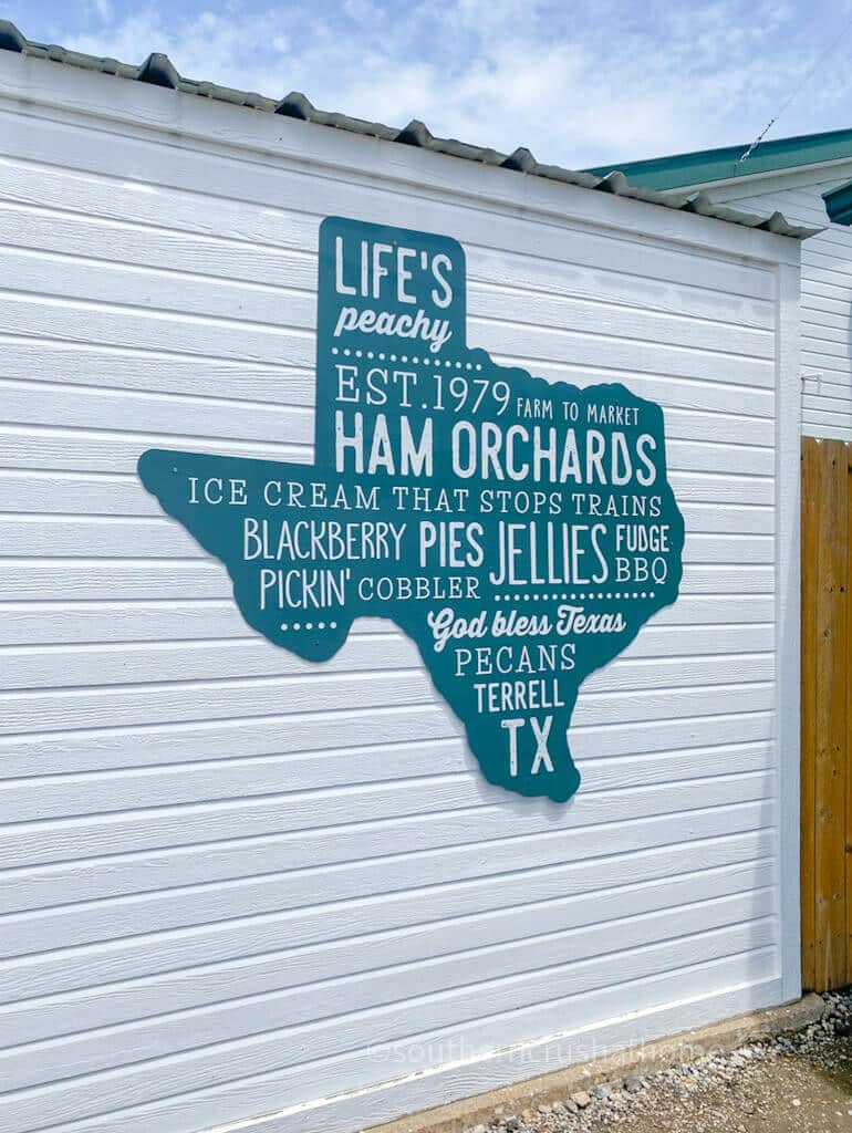 ham orchards sign in shape of texas