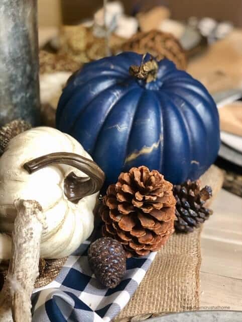 Navy blue and gold paint pour pumpkins