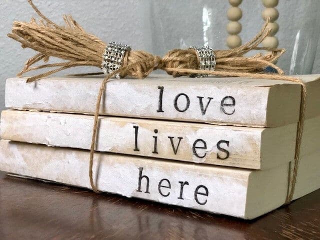 love lives here vintage handstamped book decor with bling tassels final