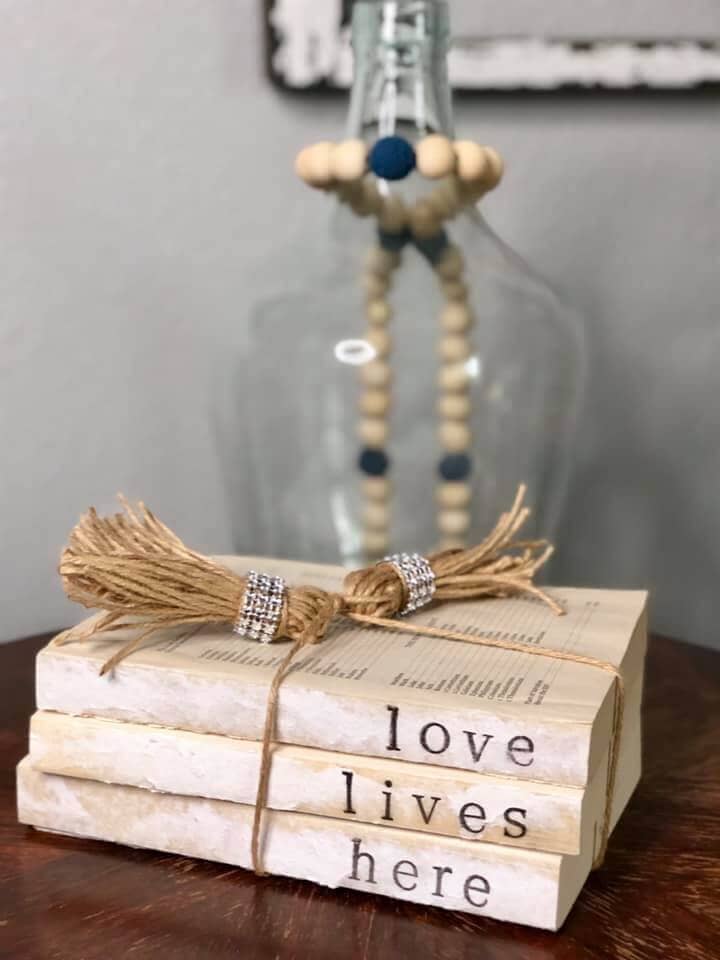 love lives here vintage handstamped book decor with bling tassels