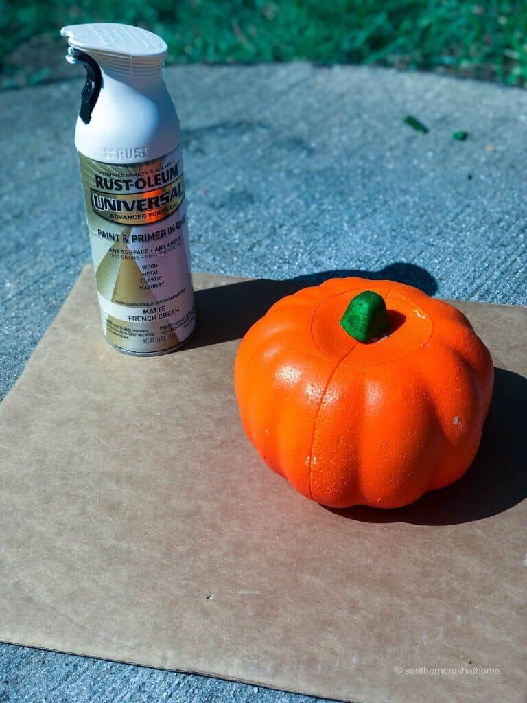 Spray paint and an orange Styrofoam pumpkin 