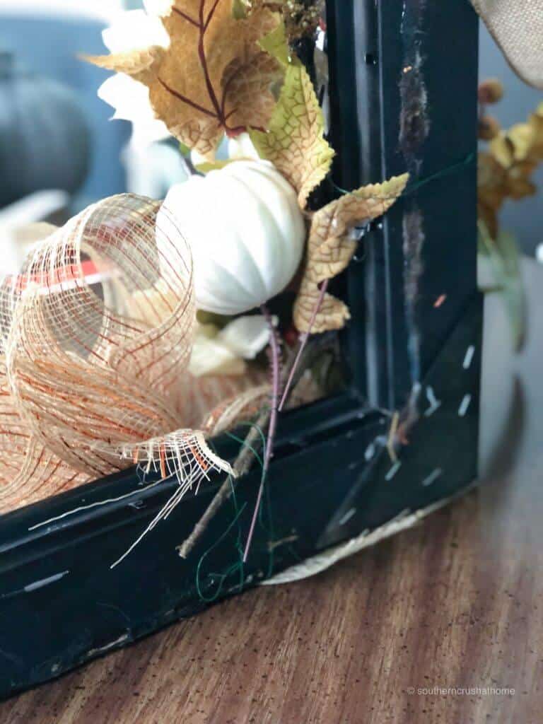 The back corner of a picture frame wreath 