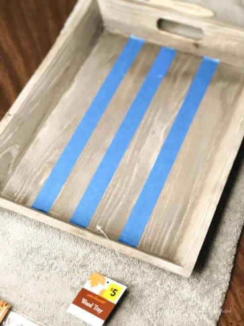 Blue Painter's Tape On a Wooden Tray 