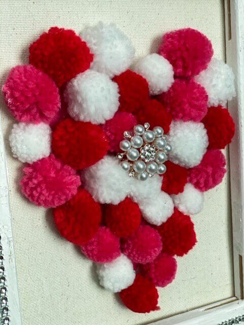 reverse canvas pom pom heart diy