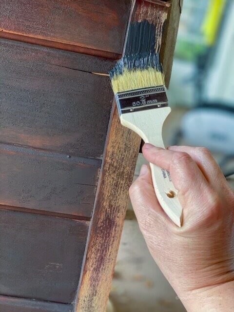 Painting the trim of a dresser 