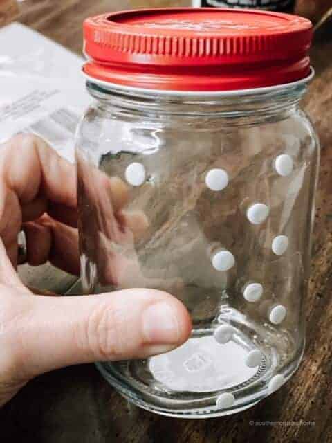 Adding pop-dot adhesives to a glass jar