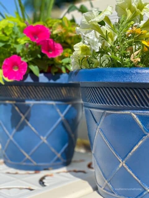 Results of learning how to make chalk paint - two blue painted planters