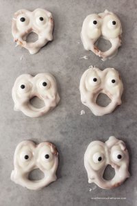 3 ingredient white chocolate ghost pretzels for Halloween drying