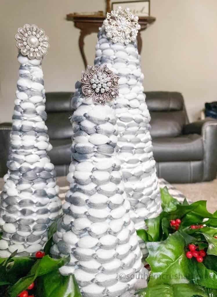 Christmas Cone Trees with holly close up