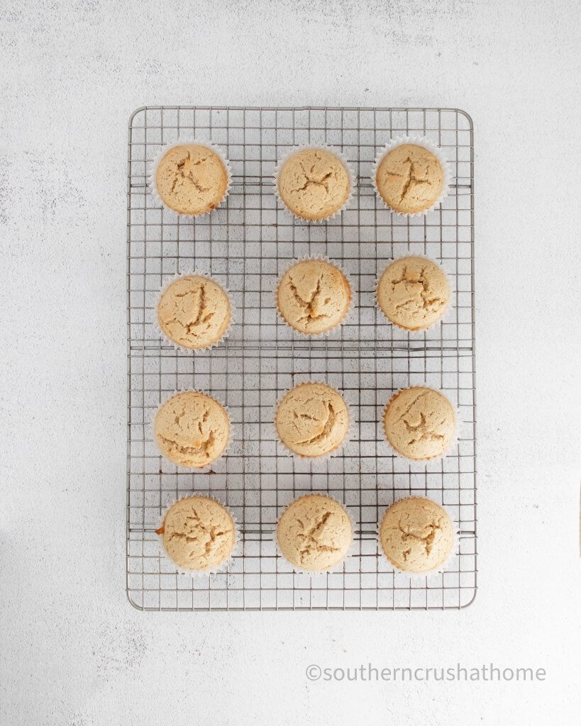 Allow cinnamon vanilla bean cupcakes to cool completely.