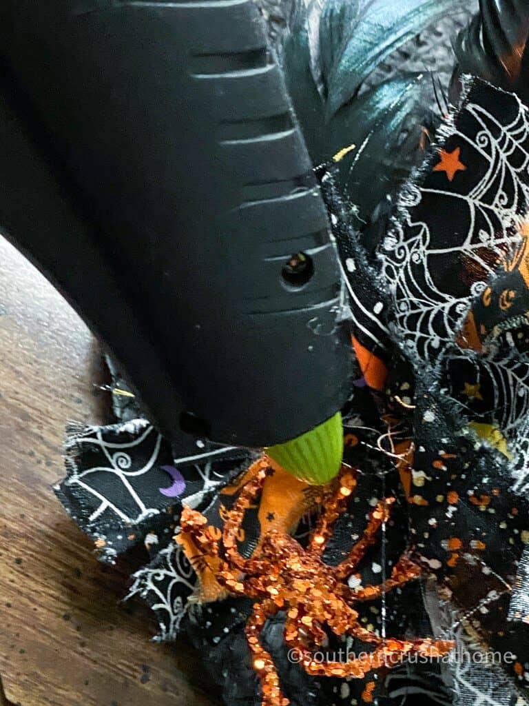 Halloween Witch Hat DIY gluing glitter spider