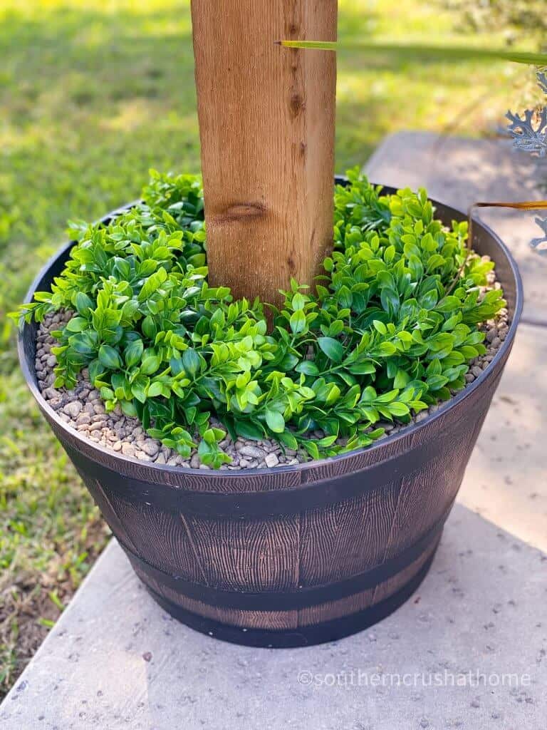 outdoor patio lighting & privacy diy wreath in barrel