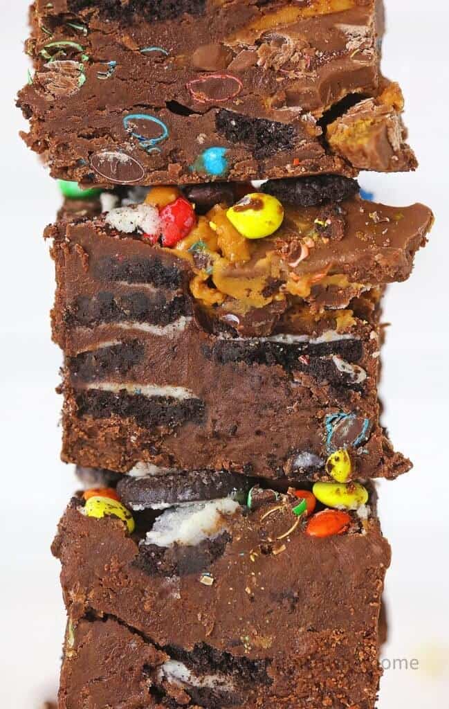 tower of m&m oreo peanut butter cup fudge squares