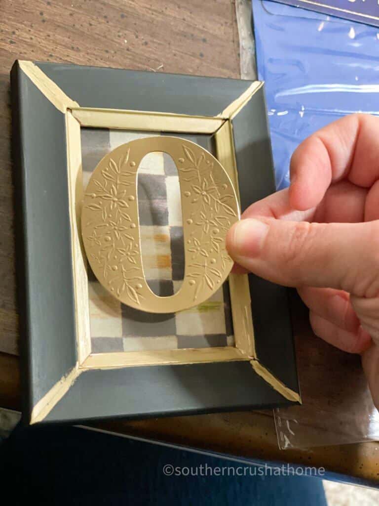 applying lettering to photo frame