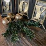 final display of JOY DIY with greenery and ornaments