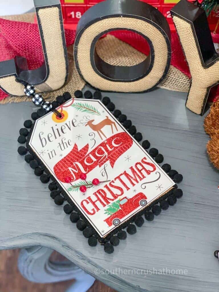 dollar tree christmas gift bag decor on entry table