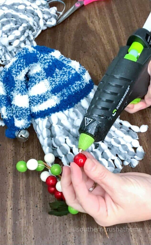 gluing the gnome ornament nose