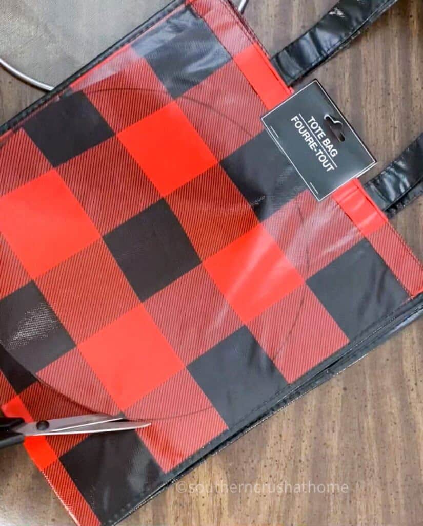 cutting out buffalo check tote bag