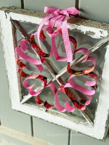 paper heart wreath on vintage window