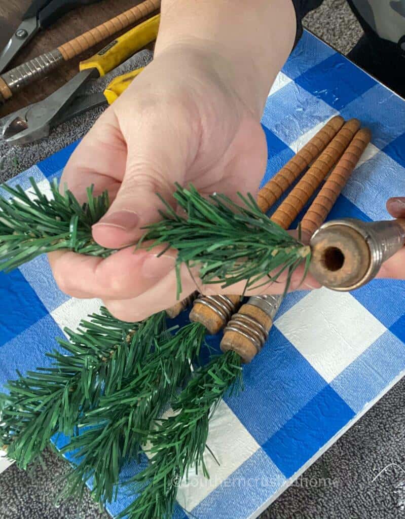 tucking greenery into bobbin